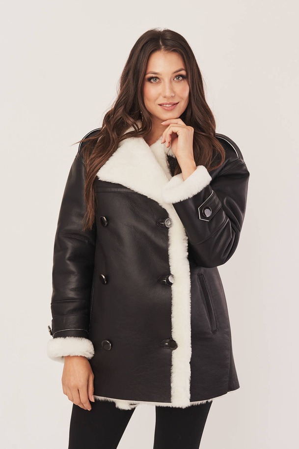 Kvinnors oversized fårskinnsjacka